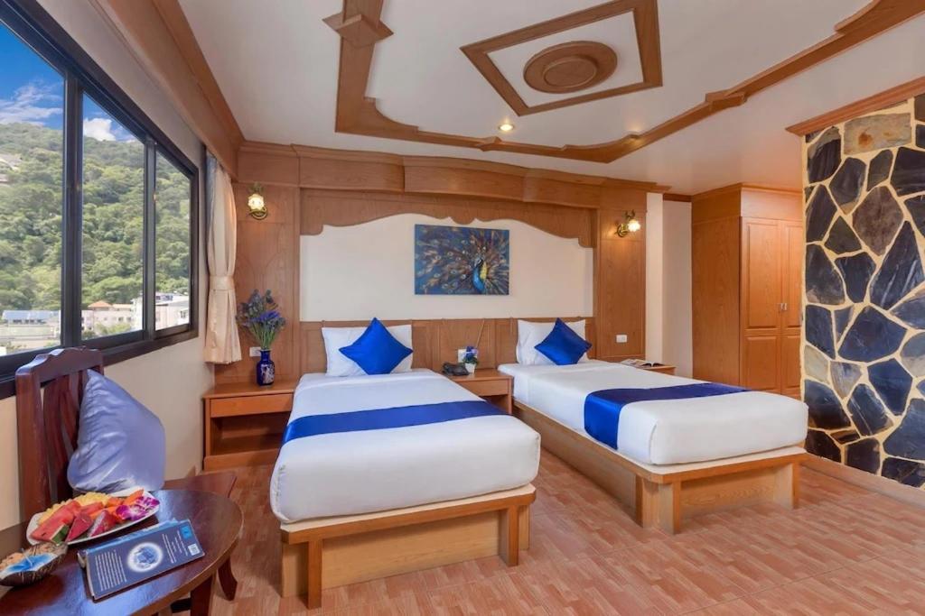 Tiger Complex By Eyg Hotel Patong Bagian luar foto